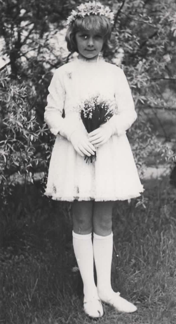 Małgosia after her First Holy Communion
